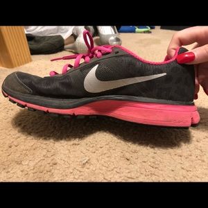 Pink and black Nikes